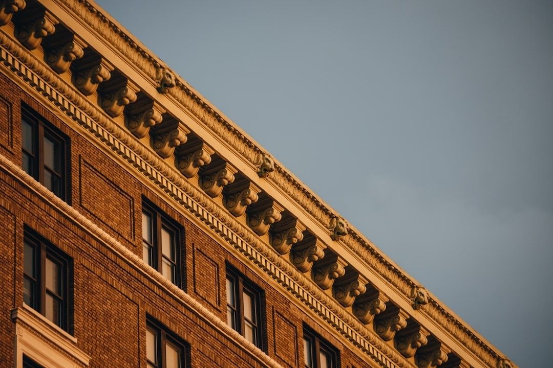 Historic brick building facade with an ornate decorative cornice